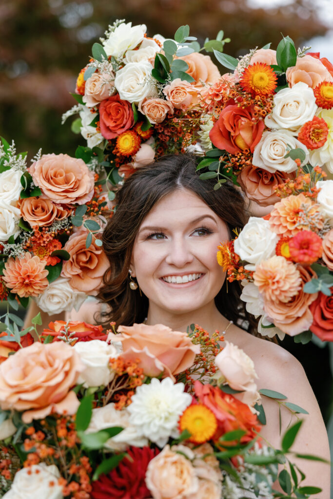 Bride with flowers around her face.